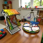 assembled merry go round and dragon swing wooden models