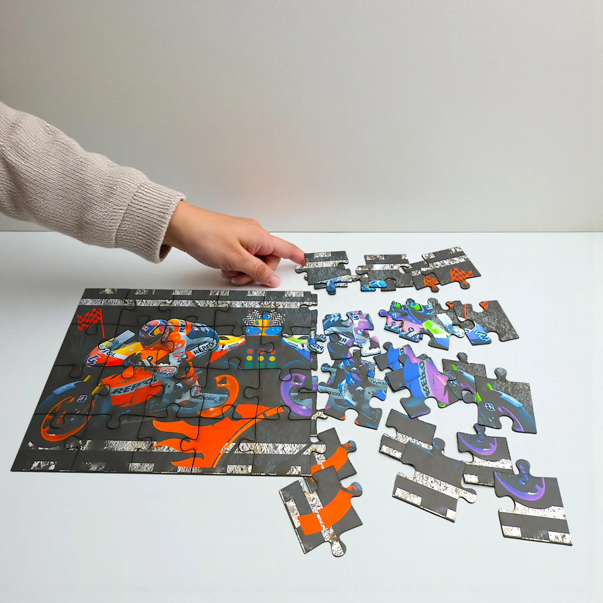 close up of car and bike puzzle pieces for kids
