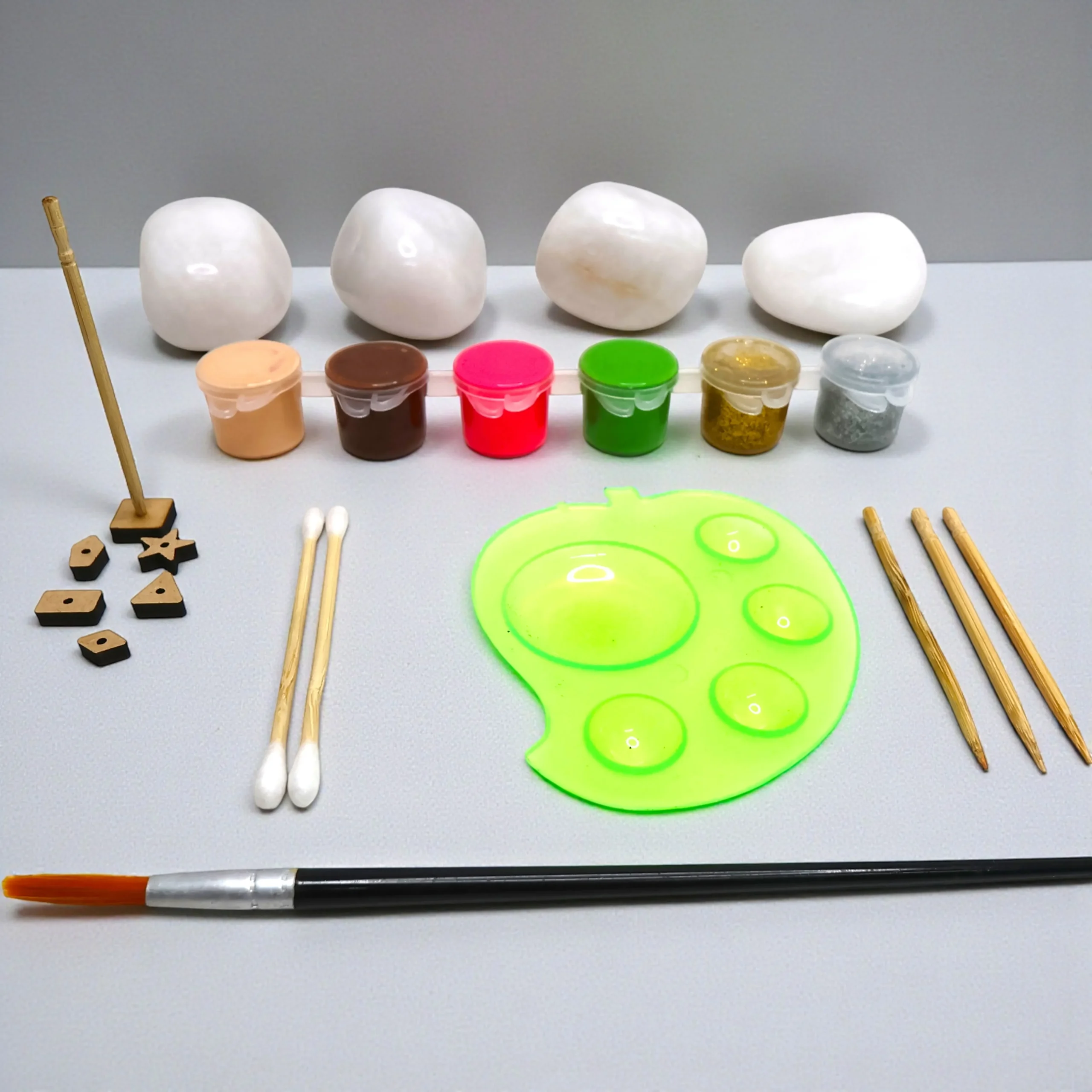 DIY rock painting kit with stones paints and brushes