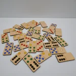 complete wooden domino set showing dot patterns for number matching