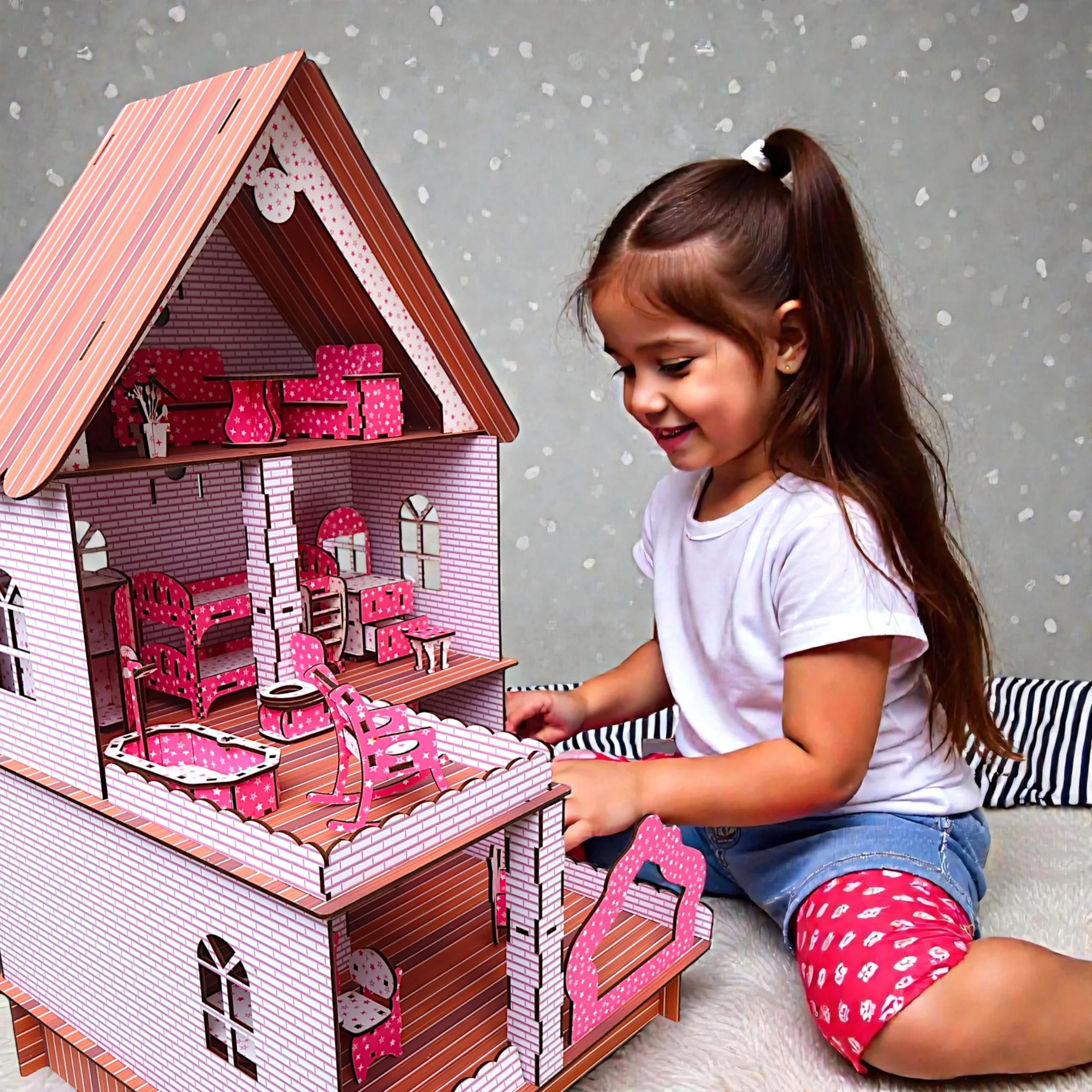 girls engaged in playing with wooden dollhouse toy