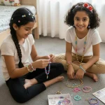 kids making bracelets using jewellery beads diy kit