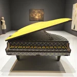 miniature piano and gramophone décor set placed on living room shelf as decorative accent